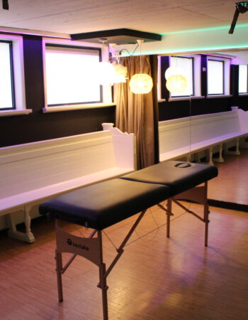 Treatment room with massage table